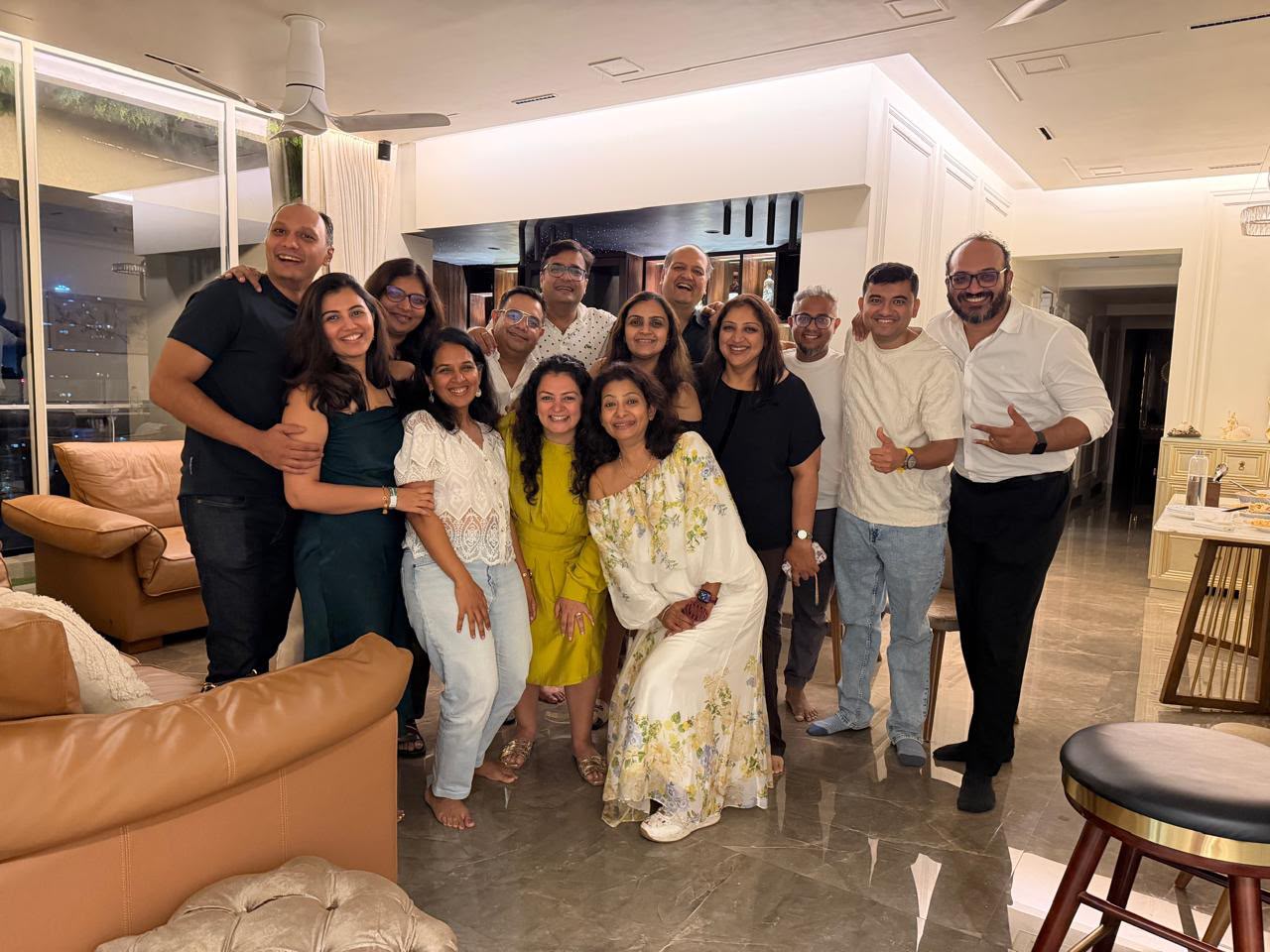 A joyful group of Entrepot Royals supporters celebrating together